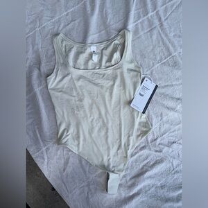 Lululemon Athletica Cream Sleeveless Fitted Bodysuit